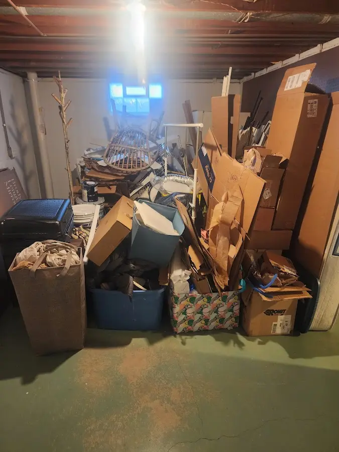 Roll-off dumpster container at job site for Yard Waste Dumpster Rental in Pecan Plantation